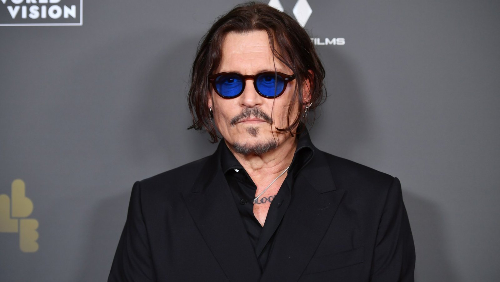 Johnny Depp Designed Bottle for Rum Brand Using Inspiration From His Tattoos and Loves of His Life