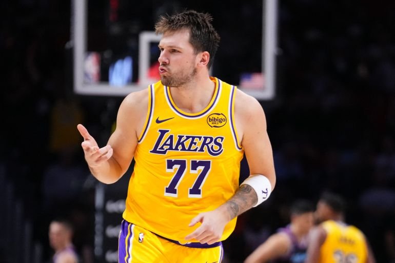 Luka Doncic scores 60 points as Lakers rally to defeat Heat in NBA