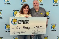 Michigan woman’s pizza run leads to record-breaking lottery win
