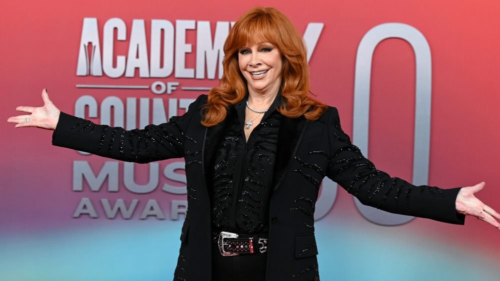 LISTEN: Reba McEntire Revels in 50 Years of Making Music and Season 3 of NBC’s ‘Happy’s Place’