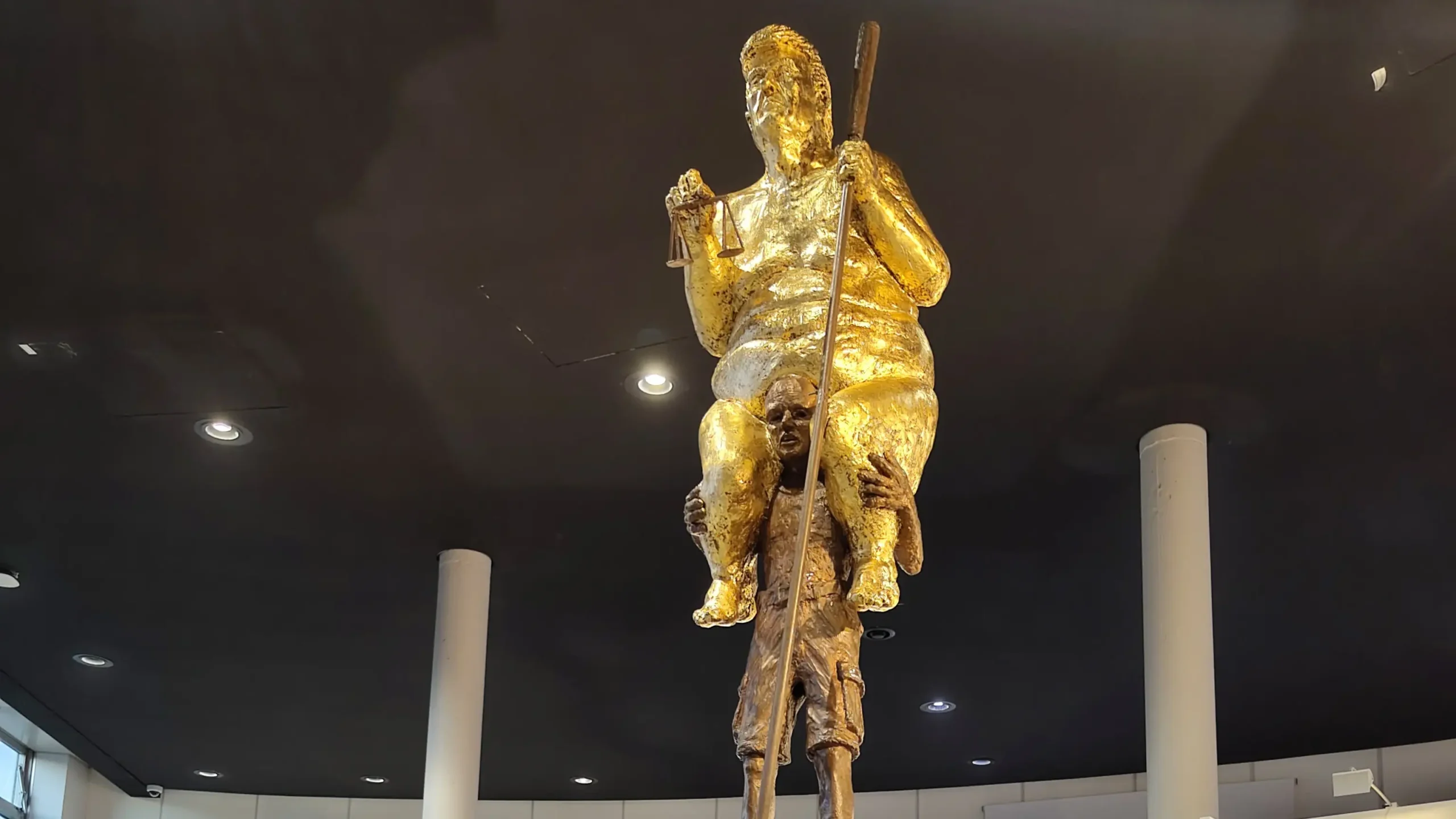 Giant naked gold Donald Trump statue unveiled at European Parliament